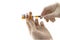 Hands of the doctor filling a vaccine syringe and bottle vaccine of Human papillomavirus (HPV) vaccine on white