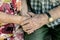 Hands of elderly couple, holding hands of seniors together close-up, concept of relationships, marriage and old people