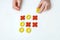Hands elderly woman seniors play tic-tac-toe wood board game. Developmental game. Concept of family pastime. XO XO symbols. Games