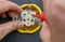 Hands electrician with screwdriver while repairing an electrical