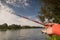 Hands with feednig rod, river fishing river