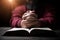 Hands folded in prayer on a Holy Bible in church concept for faith, spirituality and religion, man praying in morning. Man hand