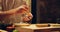 Hands, food and chef cooking sushi in restaurant for traditional Japanese cuisine or dish closeup. Kitchen, table for