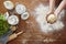 Hands forming dough atmospheric kitchen scene