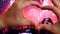 Hands forming heart at live music concert close up