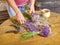 Hands of gardener woman create relaxing smell herbal bouquet.