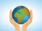 Hands gente holding Planet Earth globe. Vector illustration.