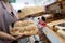 Hands of girl holding sliced white bread product,choosing wheat bread in plastic bag packaged,fresh homemade baked bread in the