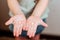 Hands of a girl in soap