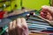 Hands of the glassmaker, shaping figurines from murano glass.