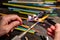 Hands of the glassmaker, shaping figurines from murano glass.