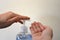 Hands and hand sanitiser in gel pump