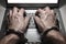 Hands in handcuffs typing on laptop keyboard internet obsession or addiction