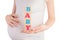 Hands holding alphabet wooden blocks with baby sign