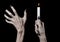 Hands holding a candle, a candle is lit, black background, solitude, warmth, in the dark, Hands death, hands witch