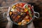 Hands holding fried ribs in a pan with rosemary, potatoes rustic