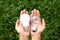 Hands holding LED Bulb and Fluorescent bulb comparing in hands