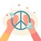 Hands holding peace hippy symbol and summer flowers