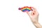 Hands holding rainbow hearts with arrow