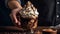 Hands holding a steaming cup of coffee with whipped cream and chocolate shavings created with Generative AI