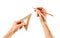 Hands holding a triangular ruler and pencil on a white background. Closeup