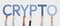 Hands holding up blue letters forming the word crypto