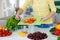 The hands of Housewives during cooking salad