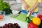 The hands of Housewives during cooking salad