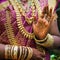 Hands of an Indian bride adorned with jewelery