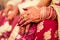 Hands of an Indian Bride, Mehndi or Henna during a wedding ceremony.