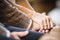 Hands intertwined wedding couple on wedding day