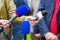 the hands of journalists hold microphones for an interview