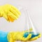 Hands of laboratory assistant in rubber gloves doing chemical analysis in laboratory