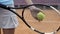 Hands of lady player holding racket and preparing to serve tennis ball, close up