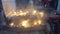 Hands light candles for worship people`s legs on background hindu temple timelapse