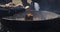 Hands lighting incense sticks at the temple of Todai-ji in nara in japan