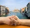 Hands of lovers in venice