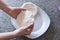 Hands making arepas in the kitchen. Latin food.