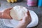 Hands making arepas in the kitchen. Latin food