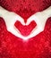 Hands making heart on red fluffy background.Valentine`s day concept.Love concept.peace.