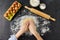 Hands making shortcrust pastry dough on table