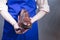 Hands of Male Shoes Cleaner with Cloth For Brown Leather Penny Loafers Footwear While Cleaning Process