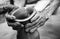 Hands of a man creating pottery on wheel