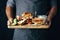 hands man cutting board vegetarian appetizer quesadilla vegetables cheese