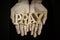 Hands of man show a word of pray