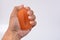 Hands of a man squeezing a stress ball