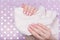 Hands with manicure. Delicate pink nail polish. Care for hands. Close-up