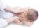 Hands massage the spine of baby