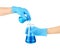 Hands in medical gloves and flasks with reagents