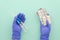 The hands of the medical worker in rubber gloves hold the medicine tablet ampoules and syringes injections.